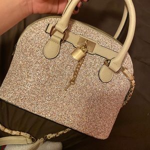 Gently used Aldos bag, patten leather,